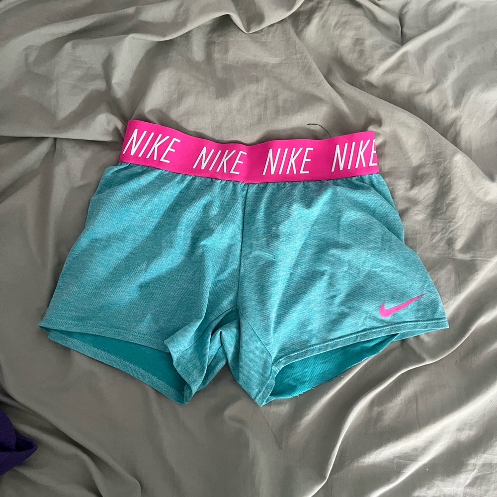 Pink and blue Nike spandex